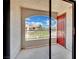 Balcony view of community buildings with red door, offering a great view of the neighborhood at 950 Seven Hills Dr # 124, Henderson, NV 89052