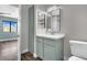 Modern bathroom featuring a marble countertop, sleek fixtures, and stylish tile flooring at 950 Seven Hills Dr # 124, Henderson, NV 89052