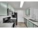 Modern kitchen featuring updated appliances, countertop and contemporary design at 950 Seven Hills Dr # 124, Henderson, NV 89052