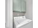 Practical laundry area with a white washing machine at 950 Seven Hills Dr # 124, Henderson, NV 89052
