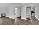 Spacious open concept, with fireplace, modern flooring, leading into a stylish kitchen at 950 Seven Hills Dr # 124, Henderson, NV 89052