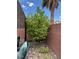 Private backyard with mature trees, gravel landscaping, and cozy seating area at 9853 Bangalore Ct, Las Vegas, NV 89148