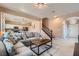 Cozy living room with a view of the kitchen and staircase at 9853 Bangalore Ct, Las Vegas, NV 89148