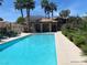 Inviting pool area with a covered pavilion and lush landscaping for a resort-like atmosphere at 10190 Deerfield Beach Ave # 202, Las Vegas, NV 89129