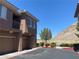 Attractive condo featuring a private garage and desert landscaping at 10190 Deerfield Beach Ave # 202, Las Vegas, NV 89129