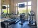 Well-equipped gym with treadmills, bikes, and mirrored walls for a complete workout experience at 10190 Deerfield Beach Ave # 202, Las Vegas, NV 89129