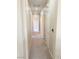Hallway with carpet and access to several rooms at 10190 Deerfield Beach Ave # 202, Las Vegas, NV 89129