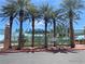 Majestic Park entrance with tall palm trees and colorful signage, a welcoming community space at 10190 Deerfield Beach Ave # 202, Las Vegas, NV 89129