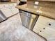 Stainless steel dishwasher with white cabinets and drawers and granite countertops at 10248 Maggira Pl, Las Vegas, NV 89135