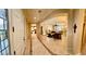 Welcoming foyer with tile flooring and an open view into the living spaces of the home at 10248 Maggira Pl, Las Vegas, NV 89135