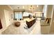 Expansive kitchen with a center island, breakfast nook, and built-in window seating at 10248 Maggira Pl, Las Vegas, NV 89135