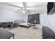 Functional bedroom with a bed, desk, fan, and piano providing versatile living and workspace at 1141 Brent Park Ct, Henderson, NV 89002