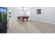 Open living space includes a pool table, tiled flooring, and bright natural light at 1141 Brent Park Ct, Henderson, NV 89002