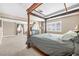 Expansive main bedroom suite boasts a large bed, fireplace, and access to the ensuite bathroom at 1141 Brent Park Ct, Henderson, NV 89002