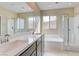 Bathroom with double sinks, soaking tub and glass-enclosed shower at 11840 Pelican Butte Ave, Las Vegas, NV 89138