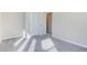 This bedroom features neutral carpet and walls, with closet that has folding doors at 11840 Pelican Butte Ave, Las Vegas, NV 89138
