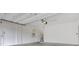 This garage includes an automatic door, water heater, and electrical outlets at 11840 Pelican Butte Ave, Las Vegas, NV 89138