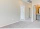 Hallway with carpet and access to the bathroom at 11840 Pelican Butte Ave, Las Vegas, NV 89138
