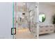 A luxurious walk-in shower with upgraded tile in a modern bathroom at 11926 Port Labelle Dr, Las Vegas, NV 89141