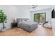 Cozy bedroom with a sliding glass door and modern decor at 11926 Port Labelle Dr, Las Vegas, NV 89141