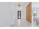 Stunning foyer with high ceilings, grand chandelier, and decorative doorway at 11926 Port Labelle Dr, Las Vegas, NV 89141