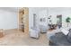 This living room features upgraded flooring, seating, and natural light at 11926 Port Labelle Dr, Las Vegas, NV 89141