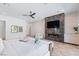 This spacious main bedroom includes a fireplace, television, and luxurious flooring at 11926 Port Labelle Dr, Las Vegas, NV 89141