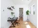 This office features a modern desk, floating shelves, and abundant natural light at 11926 Port Labelle Dr, Las Vegas, NV 89141