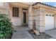Welcoming entryway with a decorative front door and neat landscaping at 1339 Echo Creek St, Henderson, NV 89052