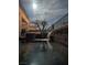 Nighttime water feature showcasing tranquil running water and landscape design at 1339 Echo Creek St, Henderson, NV 89052
