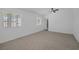 Bright bedroom enhanced by natural light and a ceiling fan at 1608 E Mcdonald Ave, North Las Vegas, NV 89030