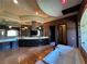 Lavish bathroom features dual vanities, a soaking tub with jets, walk-in shower and elegant lighting at 1800 Amarone Way, Henderson, NV 89012