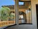 Exterior view reflected in a window with landscaping at 1800 Amarone Way, Henderson, NV 89012