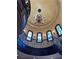 Stunning foyer with wrought iron staircase, dome ceiling, and chandelier at 1800 Amarone Way, Henderson, NV 89012