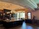 Spacious kitchen with custom cabinets, large center island, and pendant lighting at 1800 Amarone Way, Henderson, NV 89012