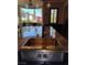 Kitchen sink with custom design elements and stone countertops at 1800 Amarone Way, Henderson, NV 89012