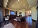 A well-appointed living room with dark wood floors at 1800 Amarone Way, Henderson, NV 89012