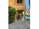 Expansive patio with grand columns, ceiling fans, and a dining area overlooking the pool, perfect for entertaining at 1800 Amarone Way, Henderson, NV 89012