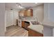 Kitchen offers wood cabinetry, a gas range, and stainless-steel dishwasher for easy meal preparation at 208 Genesee Point St, Henderson, NV 89074