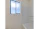 Close-up of bathroom window and tub at 212 Orland St # 28, Las Vegas, NV 89107