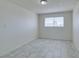 Bright bedroom featuring tile flooring and a window at 212 Orland St # 28, Las Vegas, NV 89107
