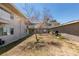 A private community courtyard with mature trees, grass, and outdoor space at 212 Orland St # 28, Las Vegas, NV 89107