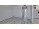 Spacious living room showcases tile floors, neutral walls, and a doorway leading to additional rooms at 212 Orland St # 28, Las Vegas, NV 89107
