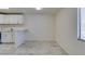 Bright living space showcases neutral colors, tile floors, and an open layout connected to the kitchen at 212 Orland St # 28, Las Vegas, NV 89107