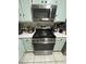 Close up on a modern stainless steel oven and range in a well-equipped kitchen at 2136 Bavington Dr # A, Las Vegas, NV 89108