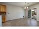 Inviting dining area with a view of the backyard and access to the covered patio at 2221 River Grove Dr, Henderson, NV 89044
