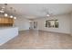 Bright living area featuring neutral paint, tile floors and a view of the landscaped backyard at 2221 River Grove Dr, Henderson, NV 89044