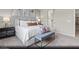 Serene main bedroom featuring a large bed, stylish decor, and plenty of natural light at 2615 Regency Cove Ct # Lot 13, Las Vegas, NV 89121