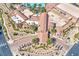 An aerial view showcases the community clubhouse amidst professionally landscaped grounds at 280 Via Del Duomo, Henderson, NV 89011