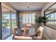 Cozy dining area filled with natural light from the glass doors leading to the backyard at 280 Via Del Duomo, Henderson, NV 89011